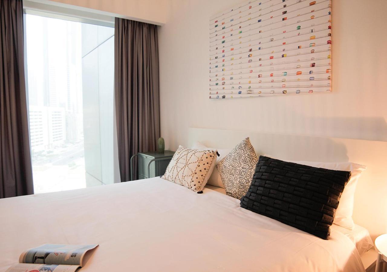 Nasma Luxury Stays - Central Park Tower Dubai Exterior foto